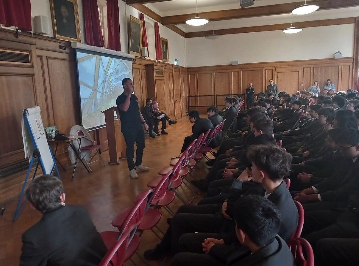 Keynote talk to students in a school assembly hall