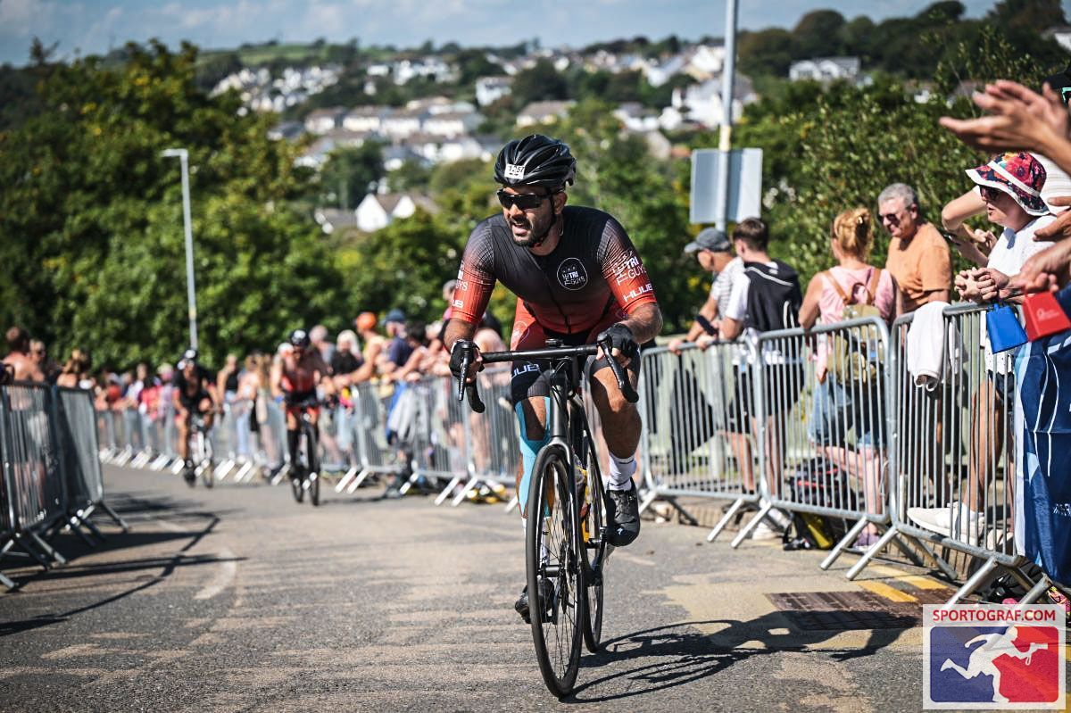 On the bike leg of an Ironman race, crowd cheering